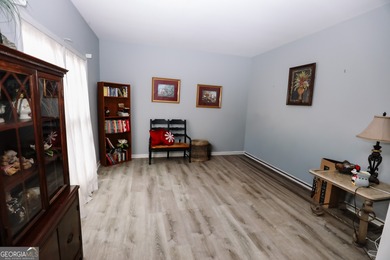 Welcome home to 116 Eastlake Landing, nestled in the highly on Summergrove Golf Club in Georgia - for sale on GolfHomes.com, golf home, golf lot