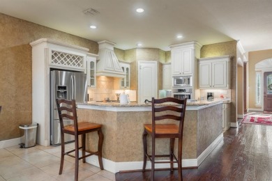 This luxurious custom Perrin Home exudes elegance, which you on Firewheel Golf Park in Texas - for sale on GolfHomes.com, golf home, golf lot