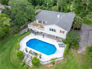 This Gorgeous Waterfront home located on Halls Mill Creek has on Cypress Country Club and Golf Club  in Alabama - for sale on GolfHomes.com, golf home, golf lot