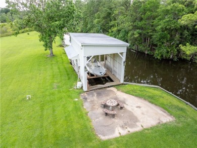 This Gorgeous Waterfront home located on Halls Mill Creek has on Cypress Country Club and Golf Club  in Alabama - for sale on GolfHomes.com, golf home, golf lot