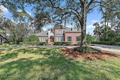 This classic beauty stands proudly on over  1/2  an acre in the on Marsh Landing Country Club - Saint Johns County in Florida - for sale on GolfHomes.com, golf home, golf lot