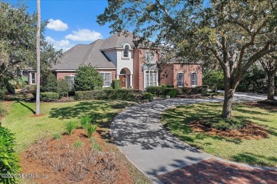 This classic beauty stands proudly on over  1/2  an acre in the on Marsh Landing Country Club - Saint Johns County in Florida - for sale on GolfHomes.com, golf home, golf lot