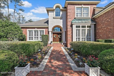 This classic beauty stands proudly on over  1/2  an acre in the on Marsh Landing Country Club - Saint Johns County in Florida - for sale on GolfHomes.com, golf home, golf lot