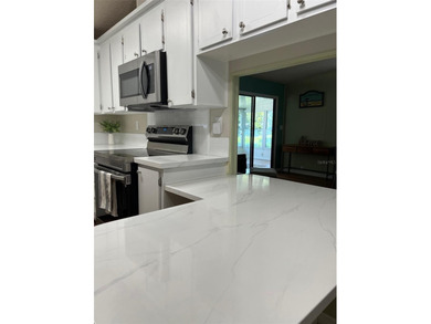 WATERFRONT: Gorgeous waterfront home in Paradise Island with on Fairway Village Golf Course in Florida - for sale on GolfHomes.com, golf home, golf lot