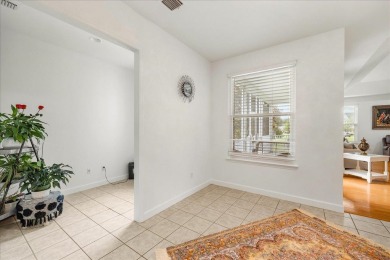 Lovely single-story home located on the SouthWood golf course on Southwood Golf Club in Florida - for sale on GolfHomes.com, golf home, golf lot