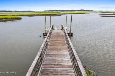 Love to fish or spend your days relaxing on the water with on Lockwood Folly Country Club in North Carolina - for sale on GolfHomes.com, golf home, golf lot