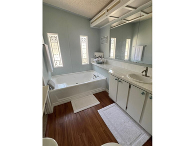 WATERFRONT: Gorgeous waterfront home in Paradise Island with on Fairway Village Golf Course in Florida - for sale on GolfHomes.com, golf home, golf lot