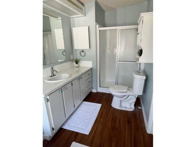 WATERFRONT: Gorgeous waterfront home in Paradise Island with on Fairway Village Golf Course in Florida - for sale on GolfHomes.com, golf home, golf lot