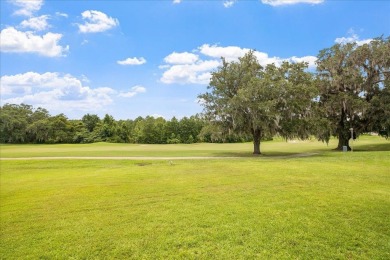Lovely single-story home located on the SouthWood golf course on Southwood Golf Club in Florida - for sale on GolfHomes.com, golf home, golf lot
