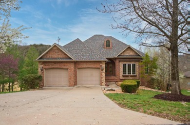 Welcome to the inviting haven of 1411 Stoney Creek Circle on Ledgestone Country Club and Golf Course in Missouri - for sale on GolfHomes.com, golf home, golf lot