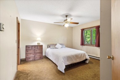 Charming Lakefront Cabin tucked away in the woods overlooking on Hide-A-Way Hills Golf Club in Ohio - for sale on GolfHomes.com, golf home, golf lot