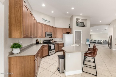 Beautiful home located in the prestigious Augusta Ranch Golf on Augusta Ranch Golf Club in Arizona - for sale on GolfHomes.com, golf home, golf lot