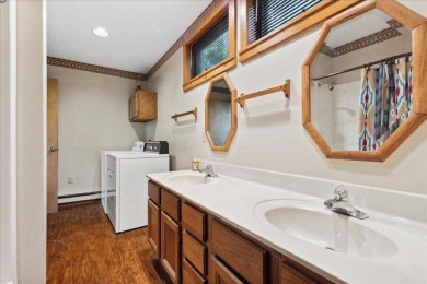 Charming Lakefront Cabin tucked away in the woods overlooking on Hide-A-Way Hills Golf Club in Ohio - for sale on GolfHomes.com, golf home, golf lot