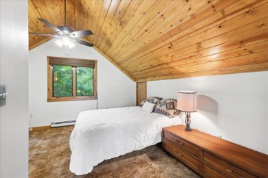 Charming Lakefront Cabin tucked away in the woods overlooking on Hide-A-Way Hills Golf Club in Ohio - for sale on GolfHomes.com, golf home, golf lot
