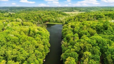 Charming Lakefront Cabin tucked away in the woods overlooking on Hide-A-Way Hills Golf Club in Ohio - for sale on GolfHomes.com, golf home, golf lot