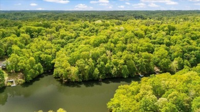 Charming Lakefront Cabin tucked away in the woods overlooking on Hide-A-Way Hills Golf Club in Ohio - for sale on GolfHomes.com, golf home, golf lot