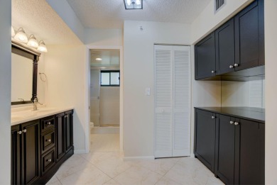 Step into unparalleled views with this stunning 7th floor on Jupiter Dunes Golf Course in Florida - for sale on GolfHomes.com, golf home, golf lot