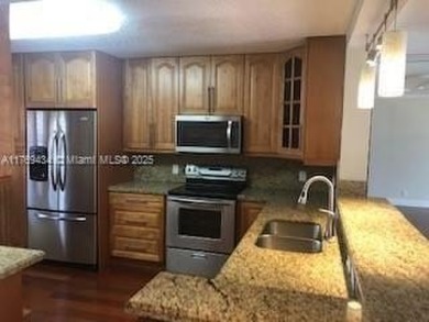 Welcome to this beautifully updated 2-bedroom, 2-bath condo on Flamingo Lakes Country Club in Florida - for sale on GolfHomes.com, golf home, golf lot