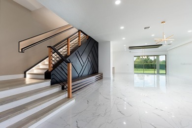 One or more photo(s) has been virtually staged. Perfectly on Eagle Creek Golf Club in Florida - for sale on GolfHomes.com, golf home, golf lot