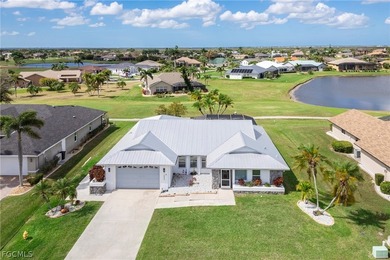 Wake up to sweeping golf course and water views in this on Royal Tee Country Club in Florida - for sale on GolfHomes.com, golf home, golf lot