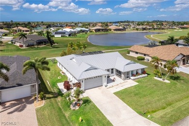 Wake up to sweeping golf course and water views in this on Royal Tee Country Club in Florida - for sale on GolfHomes.com, golf home, golf lot