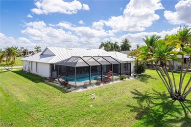 Wake up to sweeping golf course and water views in this on Royal Tee Country Club in Florida - for sale on GolfHomes.com, golf home, golf lot