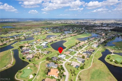 Wake up to sweeping golf course and water views in this on Royal Tee Country Club in Florida - for sale on GolfHomes.com, golf home, golf lot