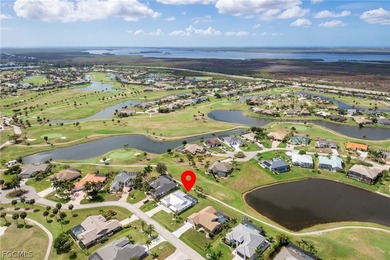 Wake up to sweeping golf course and water views in this on Royal Tee Country Club in Florida - for sale on GolfHomes.com, golf home, golf lot