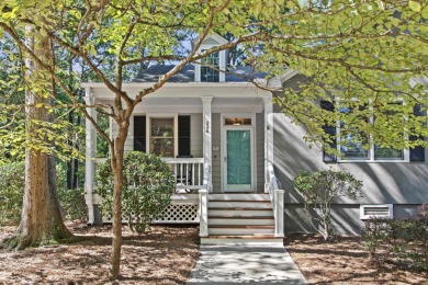 EFFORTLESS RETREAT WITH GOLF COURSE VIEWS AND INCOME POTENTIAL on Great Waters Course At Reynolds Plantation in Georgia - for sale on GolfHomes.com, golf home, golf lot