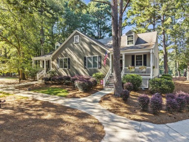 EFFORTLESS RETREAT WITH GOLF COURSE VIEWS AND INCOME POTENTIAL on Great Waters Course At Reynolds Plantation in Georgia - for sale on GolfHomes.com, golf home, golf lot