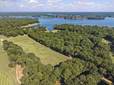 EFFORTLESS RETREAT WITH GOLF COURSE VIEWS AND INCOME POTENTIAL on Great Waters Course At Reynolds Plantation in Georgia - for sale on GolfHomes.com, golf home, golf lot