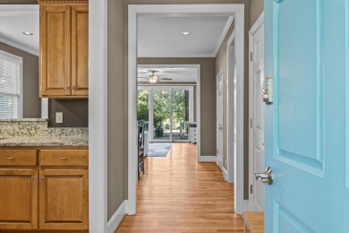 EFFORTLESS RETREAT WITH GOLF COURSE VIEWS AND INCOME POTENTIAL on Great Waters Course At Reynolds Plantation in Georgia - for sale on GolfHomes.com, golf home, golf lot