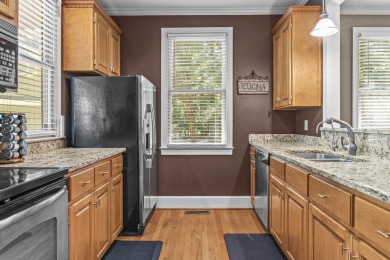 EFFORTLESS RETREAT WITH GOLF COURSE VIEWS AND INCOME POTENTIAL on Great Waters Course At Reynolds Plantation in Georgia - for sale on GolfHomes.com, golf home, golf lot