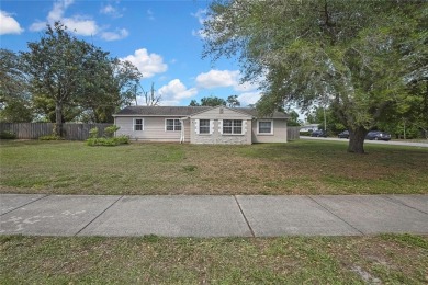 Located in FOREST HILLS, this charming Mid-Century home sits on on Babe Zaharias Golf Course in Florida - for sale on GolfHomes.com, golf home, golf lot