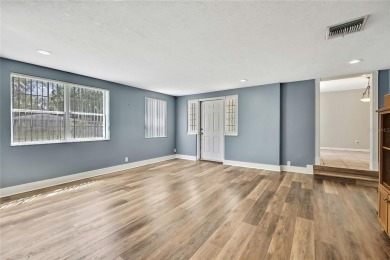 Located in FOREST HILLS, this charming Mid-Century home sits on on Babe Zaharias Golf Course in Florida - for sale on GolfHomes.com, golf home, golf lot