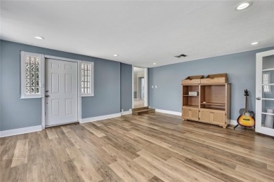 Located in FOREST HILLS, this charming Mid-Century home sits on on Babe Zaharias Golf Course in Florida - for sale on GolfHomes.com, golf home, golf lot