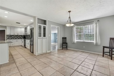 Located in FOREST HILLS, this charming Mid-Century home sits on on Babe Zaharias Golf Course in Florida - for sale on GolfHomes.com, golf home, golf lot