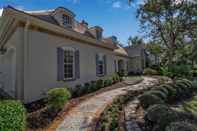 Although built in the 20th century, this home looks as authentic on The Oaks Club in Florida - for sale on GolfHomes.com, golf home, golf lot