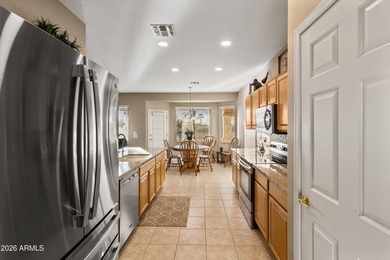 Immaculate golf course home overlooking the 15th green, tucked on Lone Tree Golf Club in Arizona - for sale on GolfHomes.com, golf home, golf lot