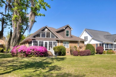 Spectacular waterfront home on Lake Arbu w/ panoramic water on Players Course At Wyboo Plantation in South Carolina - for sale on GolfHomes.com, golf home, golf lot