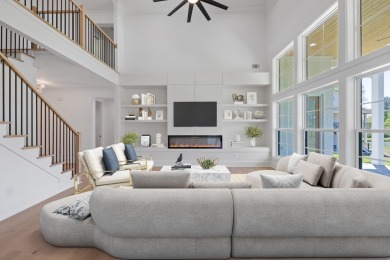 THIS GORGEOUS NEW CONSTRUCTION IS DIRECTLY ON OSPREY POINTE POND on Harbor Club Golf and Country Club in Georgia - for sale on GolfHomes.com, golf home, golf lot
