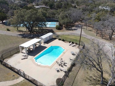Gently sloping, wooded double lot totalling .67 acre in the on Apple Rock Golf Course - Horseshoe Bay in Texas - for sale on GolfHomes.com, golf home, golf lot