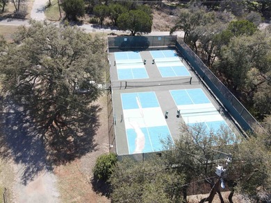 Gently sloping, wooded double lot totalling .67 acre in the on Apple Rock Golf Course - Horseshoe Bay in Texas - for sale on GolfHomes.com, golf home, golf lot