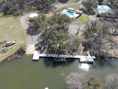 Gently sloping, wooded double lot totalling .67 acre in the on Apple Rock Golf Course - Horseshoe Bay in Texas - for sale on GolfHomes.com, golf home, golf lot