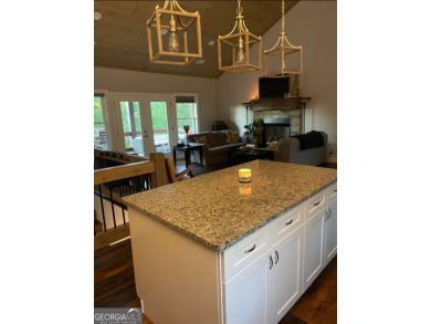 Discover your perfect mountain retreat in this stunning custom on Old Toccoa Farm Golf Club in Georgia - for sale on GolfHomes.com, golf home, golf lot