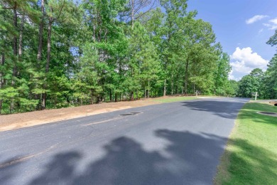 Located on the 6th fairway of the renowned National Golf Course on Reynolds Lake Oconee - The Oconee in Georgia - for sale on GolfHomes.com, golf home, golf lot