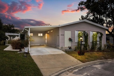 Rare opportunity in Zellwood Station! This 2-bedroom 1990 home on Zellwood Station Country Club in Florida - for sale on GolfHomes.com, golf home, golf lot