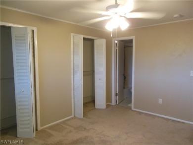 This charming second floor condo with 2 bedrooms and 2 full on Cypress Lake Country Club in Florida - for sale on GolfHomes.com, golf home, golf lot