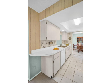 Step into light and bright Florida living with this spacious on Highland Lakes Executive Golf Course in Florida - for sale on GolfHomes.com, golf home, golf lot