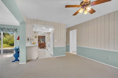 Step into light and bright Florida living with this spacious on Highland Lakes Executive Golf Course in Florida - for sale on GolfHomes.com, golf home, golf lot